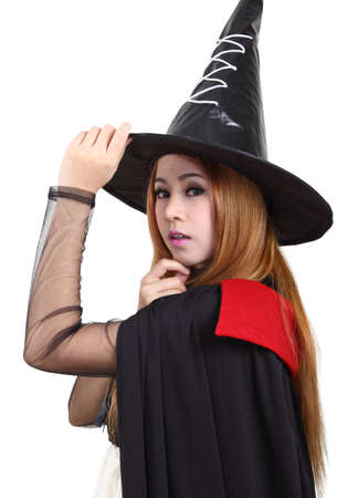 Image of portrait asian woman in black hat and black clothing on halloweenの写真素材