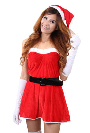 Image of asian woman wearing santa claus clothes and red hat  on white backgroundの写真素材