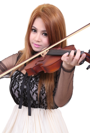 Image of asian woman play her violin on white backgroundの写真素材