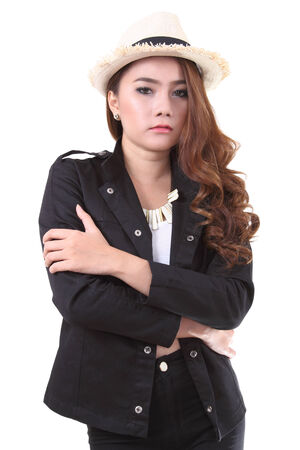 Asian young woman posing her black suit in studio on white backgroundの写真素材
