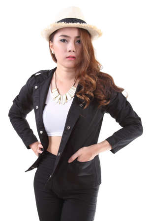 Asian young woman posing her black suit in studio on white backgroundの写真素材