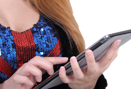 Closeup images of asian woman touch her tablet on white backgroudの写真素材