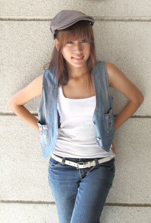 image of portrait young asian woman in jeans fashion outdoorの写真素材