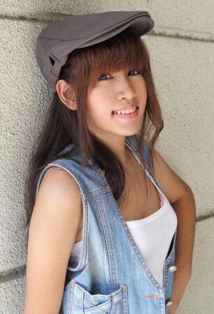 image of portrait young asian woman in jeans fashion outdoorの写真素材