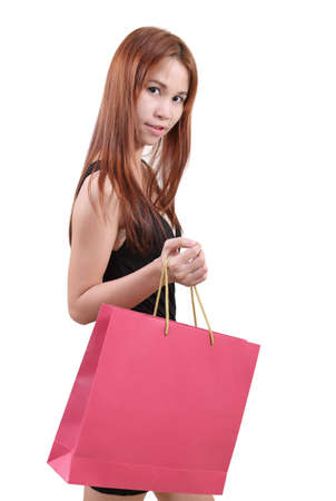 Young asian woman with red shopping bag on white background
の写真素材