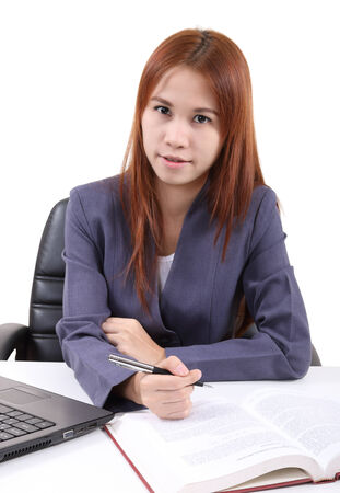image of young asian woman working in office and white backgroundの写真素材
