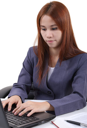 image of young asian woman working in office and white backgroundの写真素材