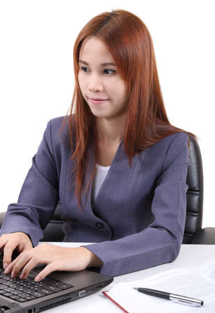 image of young asian woman working in office and white backgroundの写真素材