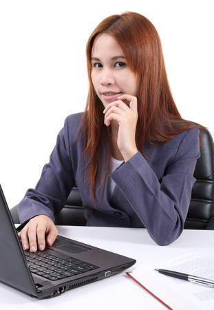 image of young asian woman working in office and white backgroundの写真素材