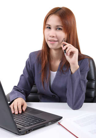 image of young asian woman working in office and white backgroundの写真素材