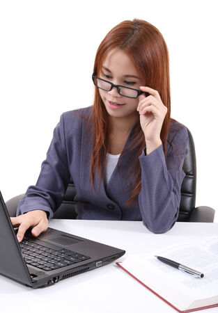 image of young asian woman working in office and white backgroundの写真素材