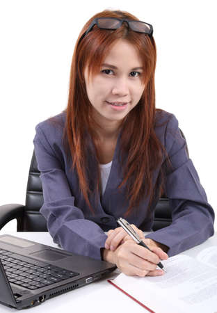 image of young asian woman working in office and white backgroundの写真素材