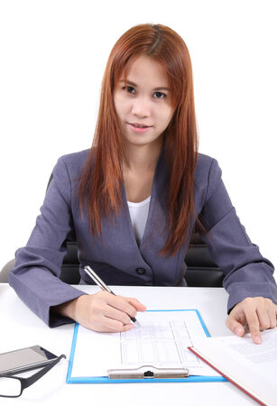 image of young asian woman working in office and white backgroundの写真素材