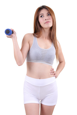 asian woman posing with dumbbell for fitness on white backgroundの写真素材