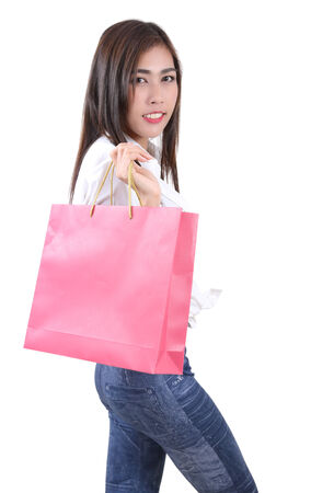 beautiful asian woman holding shopping bag on her handの写真素材