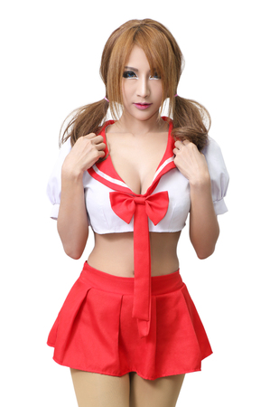 young woman in japanese student uniform on white backgroundの写真素材