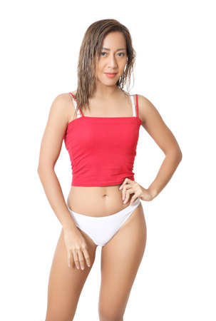 portrait beautiful asian woman in red croptop and white bikiniの写真素材