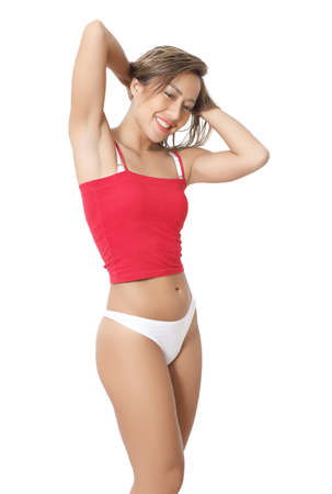 portrait beautiful asian woman in red croptop and white bikiniの写真素材