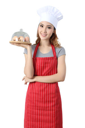 asian woman chef with white hat prepare  cooking and white backgroundの写真素材