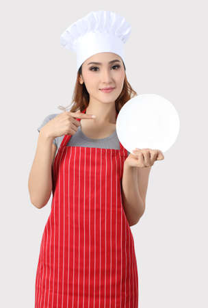 asian woman chef with white hat prepare  cooking and white backgroundの写真素材