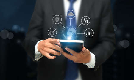 businesswoman working online business with intenet technology at office to check business report...