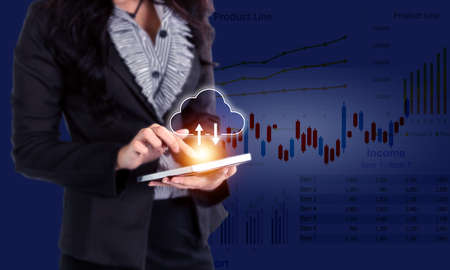 businesswoman working online business with intenet technology at office to check business report...