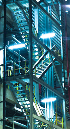 Industrial zone, steel pipelines and staircase in a plantの写真素材
