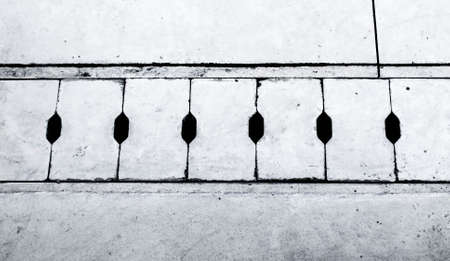 Cement hole covering in streetの写真素材