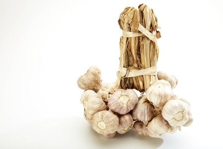 Garlic condiment on white backgroundの写真素材