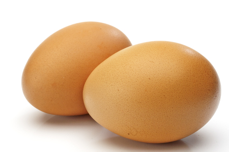 Eggs on it on a white background.の写真素材