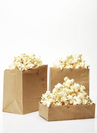 Popcorn in box isolated on white backgroundの写真素材