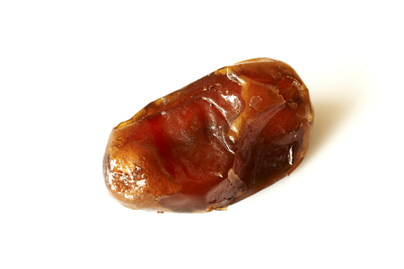 dates fruit isolated on white backgroundの写真素材