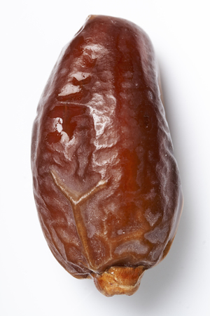 dates fruit isolated on white backgroundの写真素材