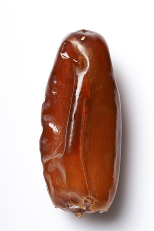 dates fruit isolated on white backgroundの写真素材