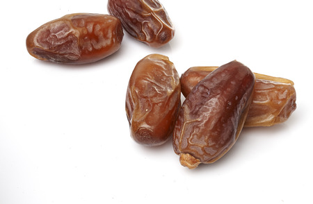 dates fruit isolated on white backgroundの写真素材