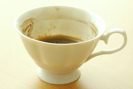 coffee cup On The wood Table by the window with ornaments empty.の写真素材