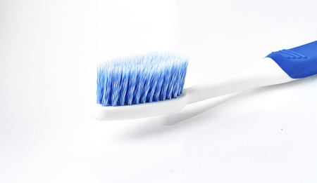 Blue Toothbrush on a white background.の写真素材