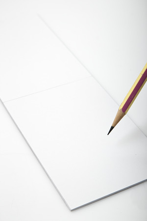 Pencil and paper white backgroundの写真素材