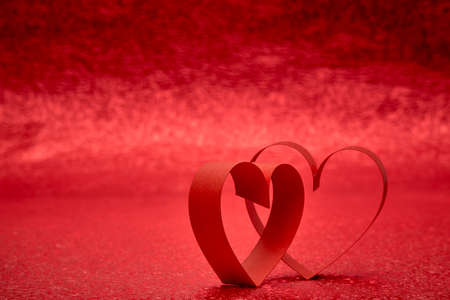 Red Ribbon Heart, red backgroundの写真素材