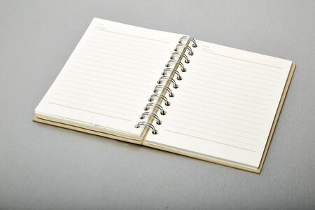 Brown note book, Aluminum texture backgroundの写真素材