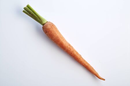 Carrot vegetable with leaves isolated on white background cutout