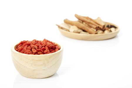 Cinnamon, star anise, cardamom, galangal,  on a white background.の写真素材