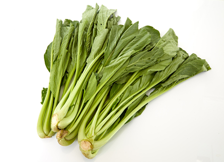 Spinach on white background, Chinese mustard green on white background