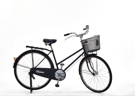 old and rusty vintage bicycle on whiteの写真素材