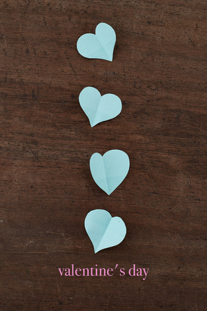 blue paper hearts media love putting on old Woodenの写真素材