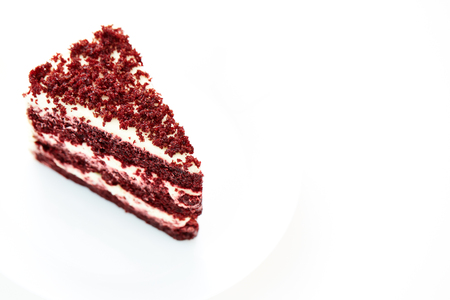 piece of delicious Red Velvet cheesecake on white background. Copy space with selective focusの写真素材