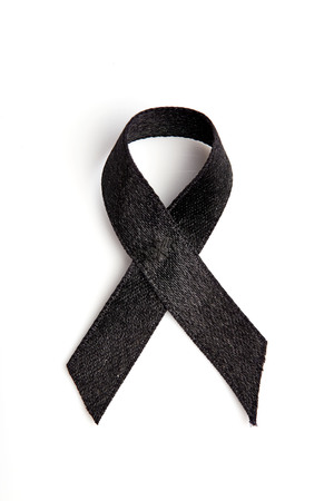 Black ribbon isolated on white. Melanoma and mourning conceptの写真素材