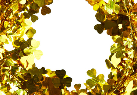 Christmas tree shaped gold-clad circular fabric on a white backgroundの写真素材