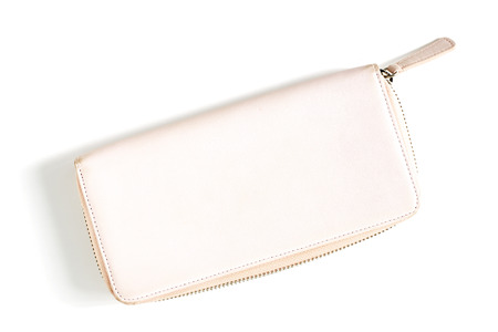 Woman pink purse isolated on the white background Top view on the walletの写真素材