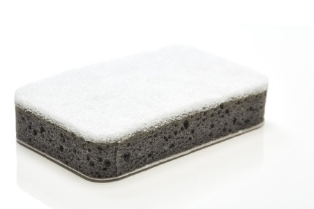 close up of dish washing sponge on white background with clipping pathの写真素材